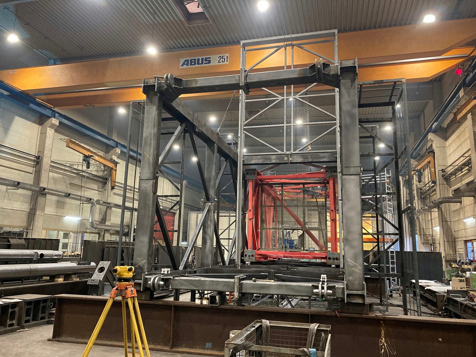 Welded portal frame with pin joints being aligned with an optical level – crane steel fabrication at Bock Maschinenbau Lorch